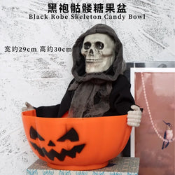 Orange pumpkin-shaped candy bowl with black jack-o-lantern face for Halloween skeleton candy and pirate prop decoration