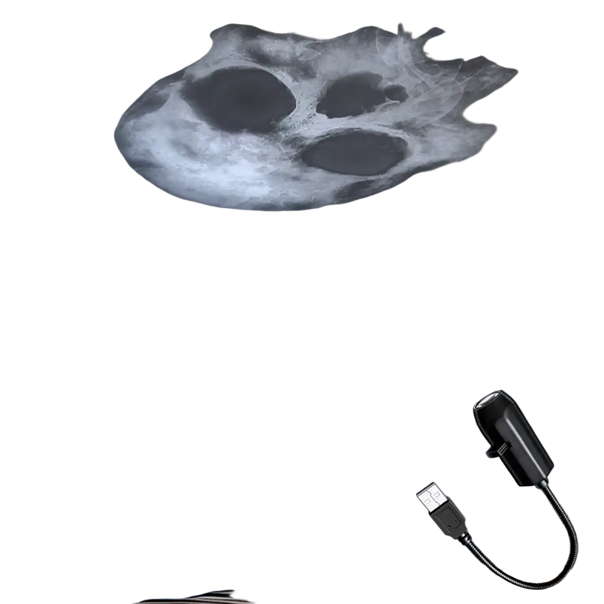 Black usb-powered ceiling projector casting a ghostly white skull shadow for halloween decoration lighting