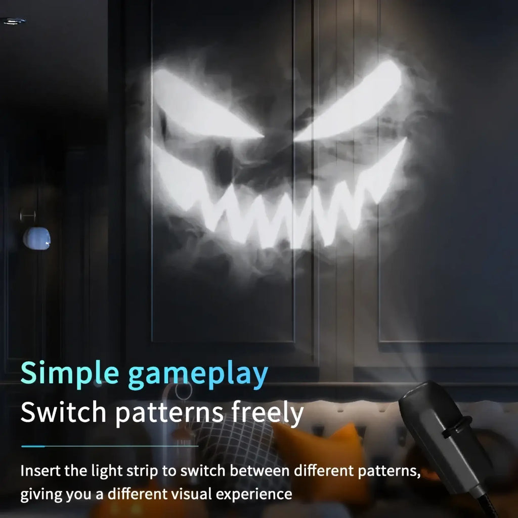 A sleek black halloween skull usb projection light casting a glowing white ghostly face with sharp teeth on the wall