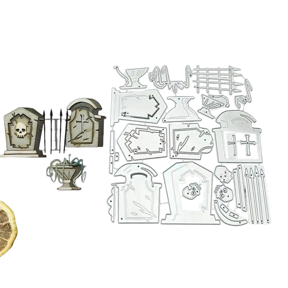 Set of silver metal Halloween tombstone cutting dies featuring skulls crosses and graveyard elements for crafting