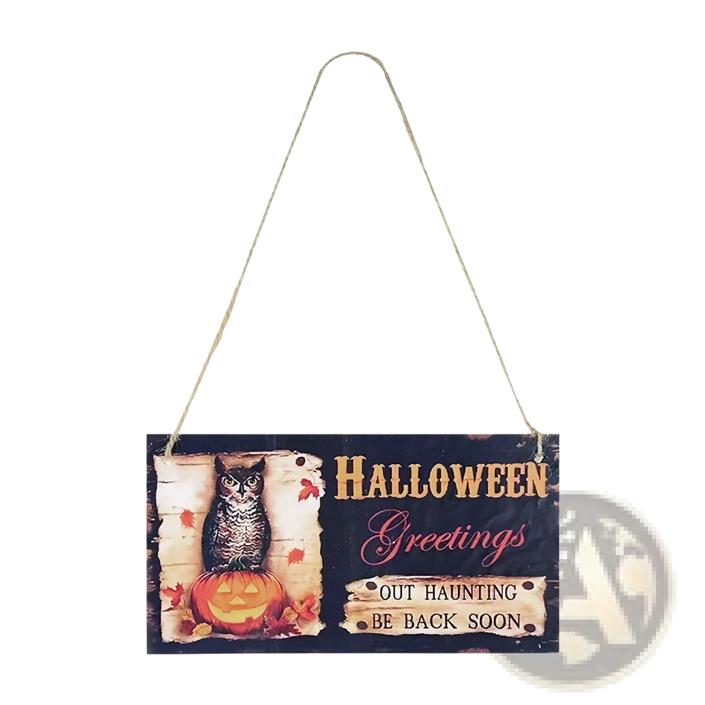 Halloween wooden hanging sign with a carved owl on a pumpkin featuring distressed black beige paint and gold pink lettering