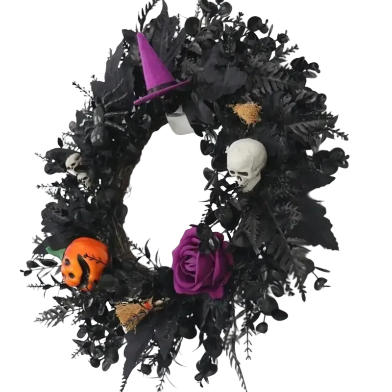 Halloween wreath featuring black artificial foliage with a purple witch hat skull orange pumpkin face and purple rose