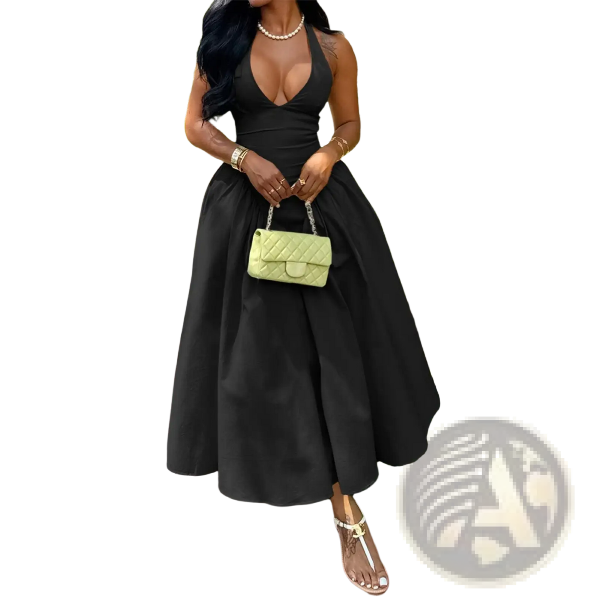 A small light green quilted handbag with chain strap complements an elegant long halter evening dress for autumn