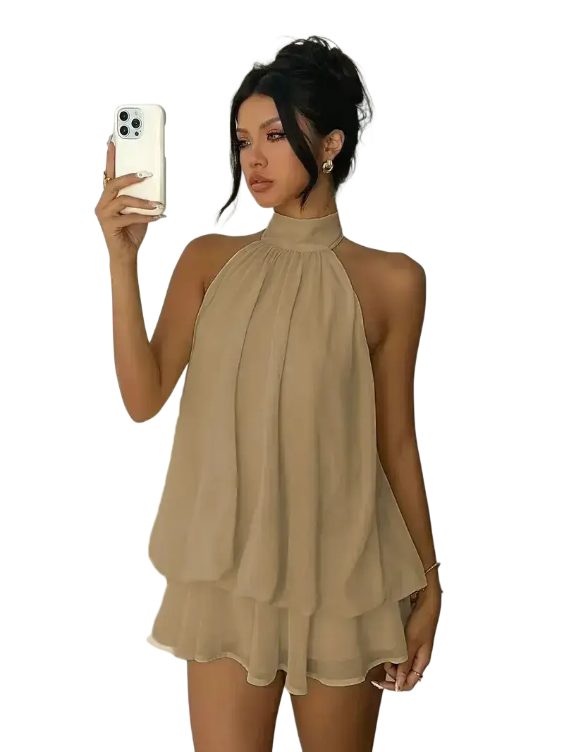 Beige sleeveless halter neck mini dress with tiered ruffle design ideal for summer beachwear