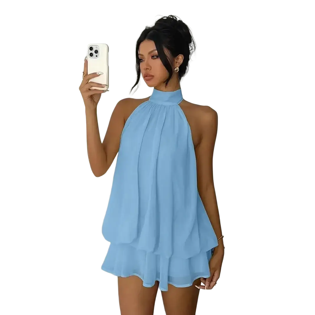 A light blue sleeveless halter ruffle mini dress with a flowing sheer layered skirt for summer beachwear