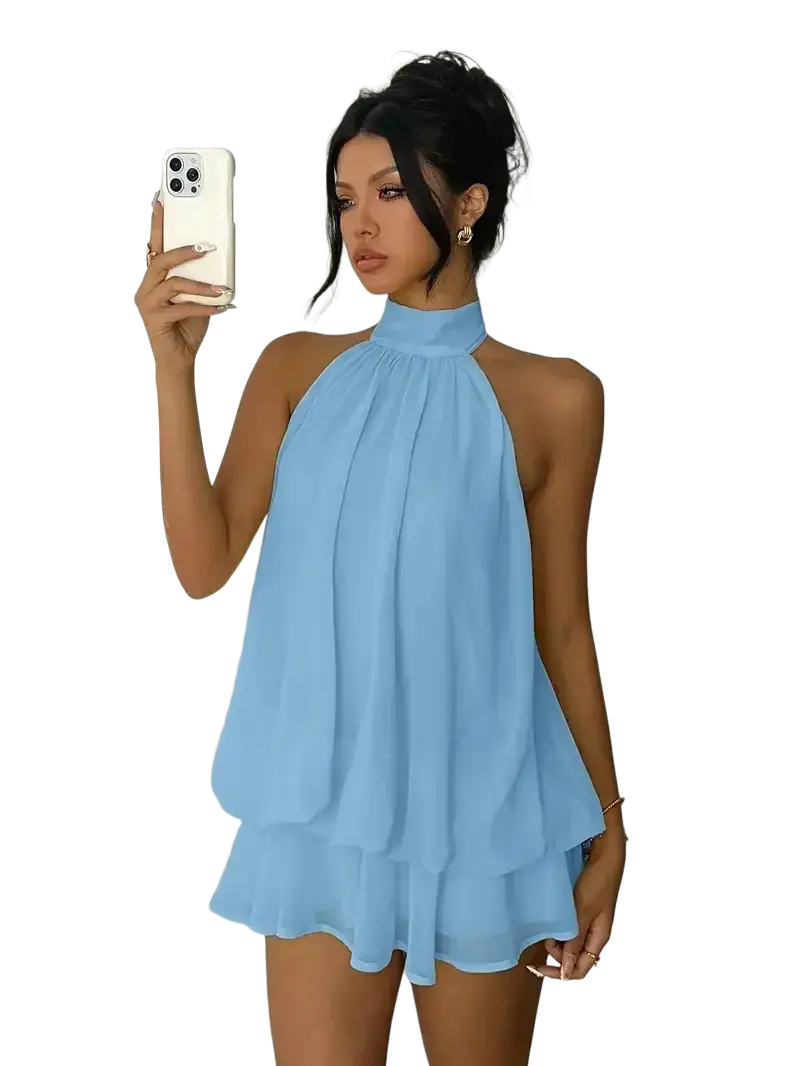 A light blue sleeveless halter neck mini dress with layered ruffles suitable for summer beachwear