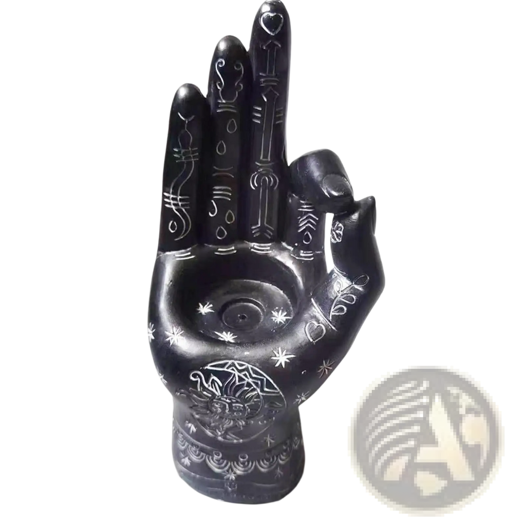 Black hamsa hand incense burner and candle holder figurine with intricate white engraved designs on ceramic material