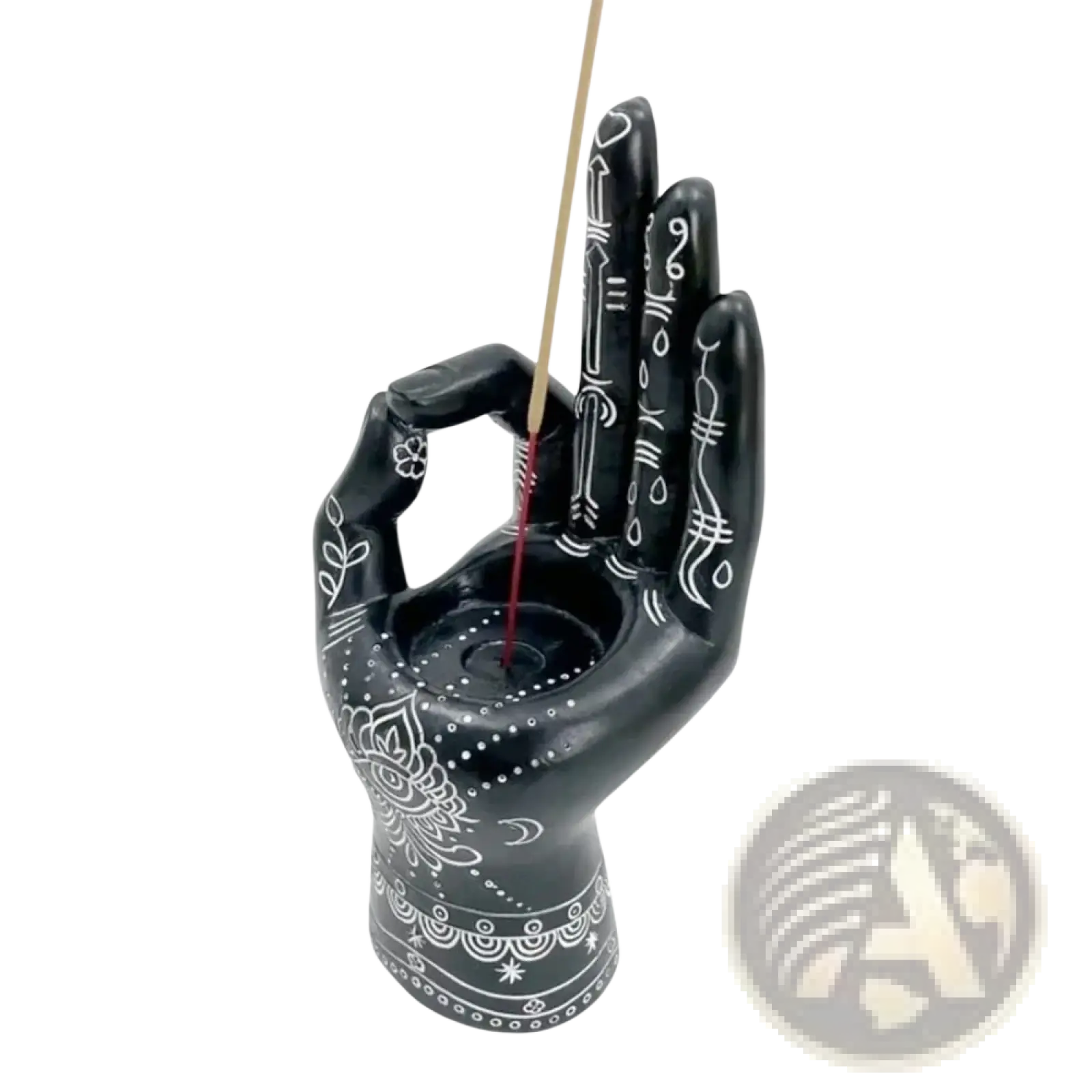Black hamsa hand incense burner with intricate white patterns used as incense holder and candle figurine