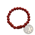 Red 8mm round bead bracelet featuring two hand carved purple gold cinnabar double pixiu charms