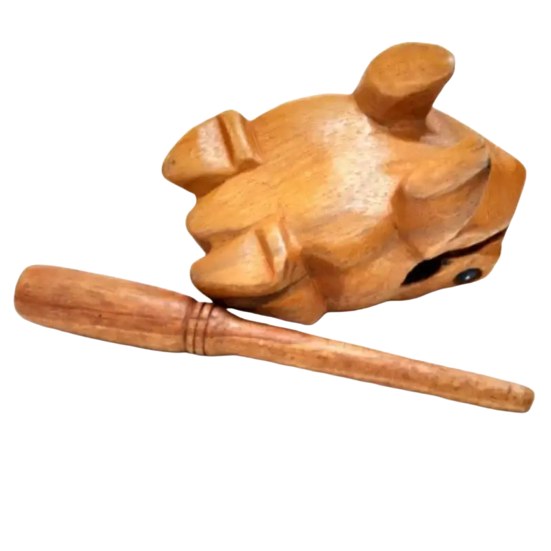 Hand carved wooden frog instrument with smooth light brown rain wood finish and black eye detail for home decor