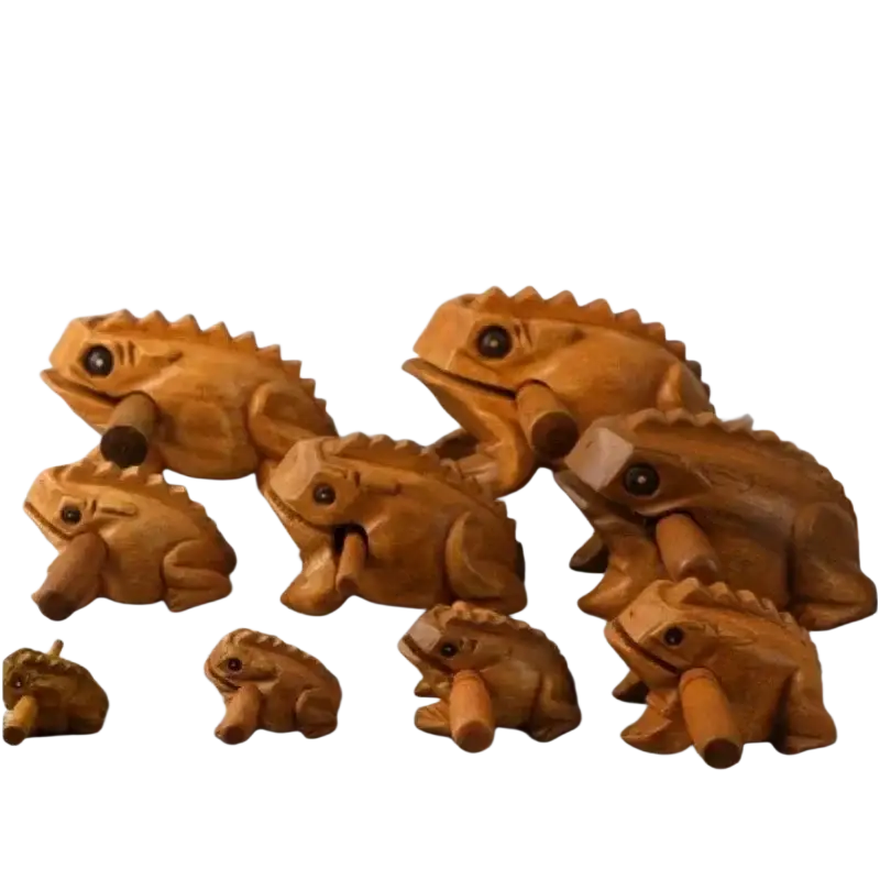 Hand carved wooden frog instrument and home decor featuring detailed spiky rain wood body in warm brown tones