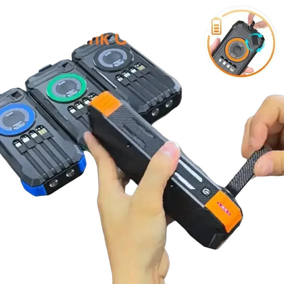 Black rugged hand crank power bank with orange accents, circular display, multiple usb ports, and micro usb input