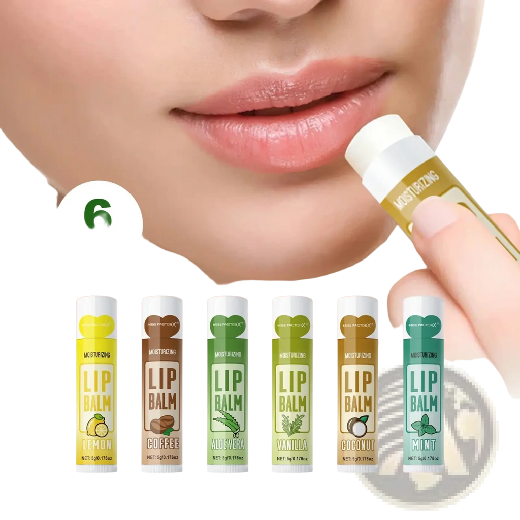 A hand holding a gold-tipped white-capped moisturizing lip balm from a hand cream and lip balm gift set six pieces