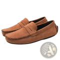 Tan suede hand-stitched loafers with classic moccasin design and black rubber soles handmade velvet shoes