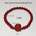 Handcrafted cinnabar red beaded bracelet featuring a carved elephant charm and lotus and calabash design elements
