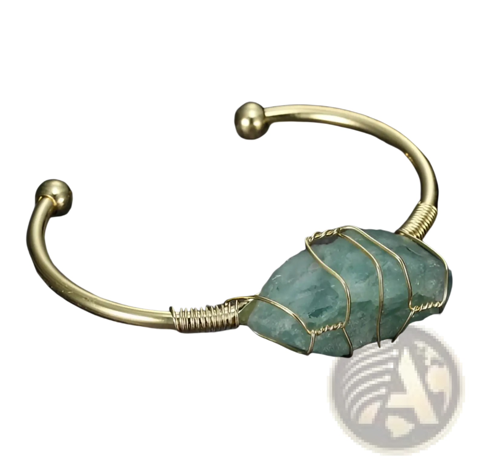 Handcrafted natural gemstone wire wrapped gold cuff bracelet with a gold-toned wire and rough-cut teal green gemstone