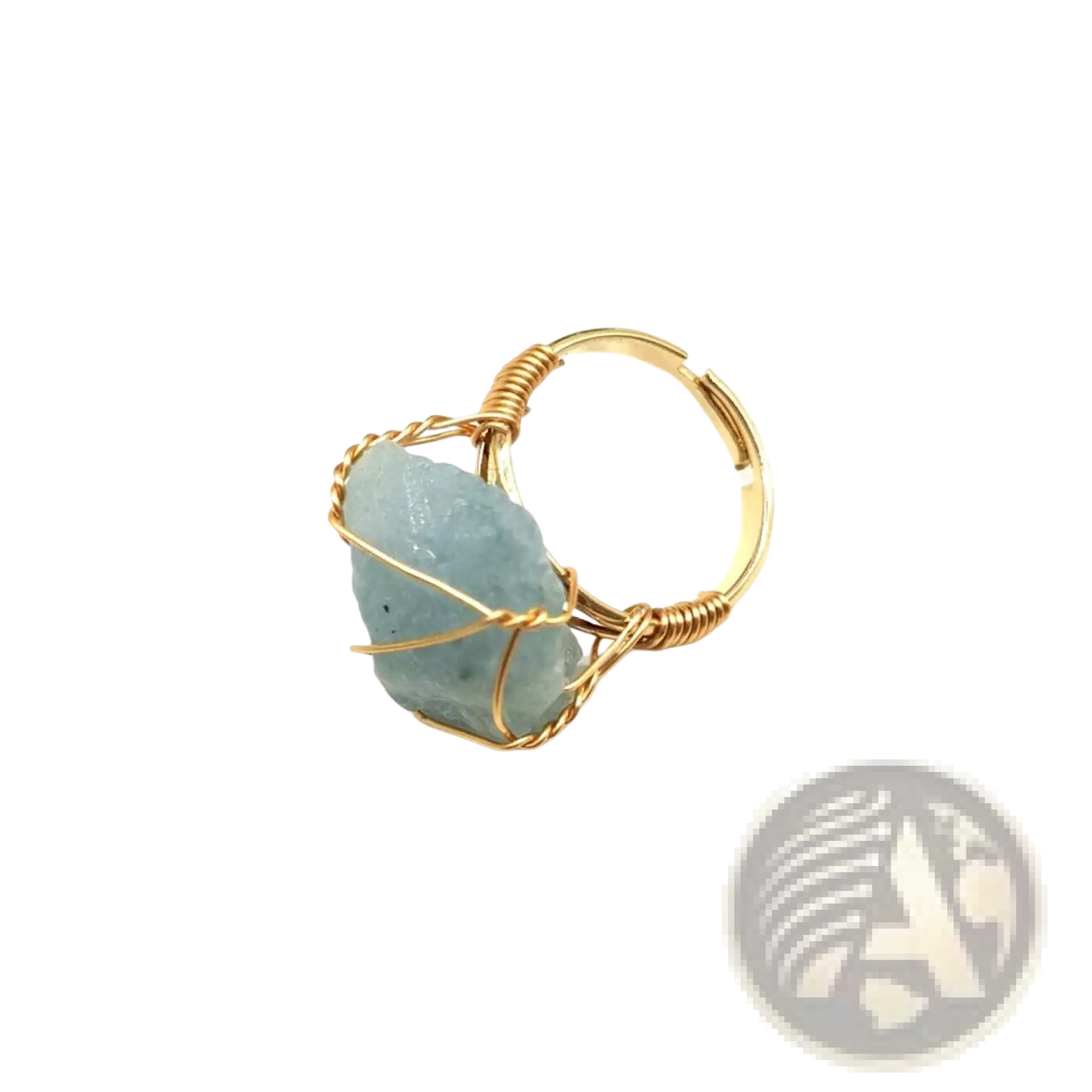 Handcrafted adjustable gold wire wrapped ring featuring a delicate raw light blue gemstone