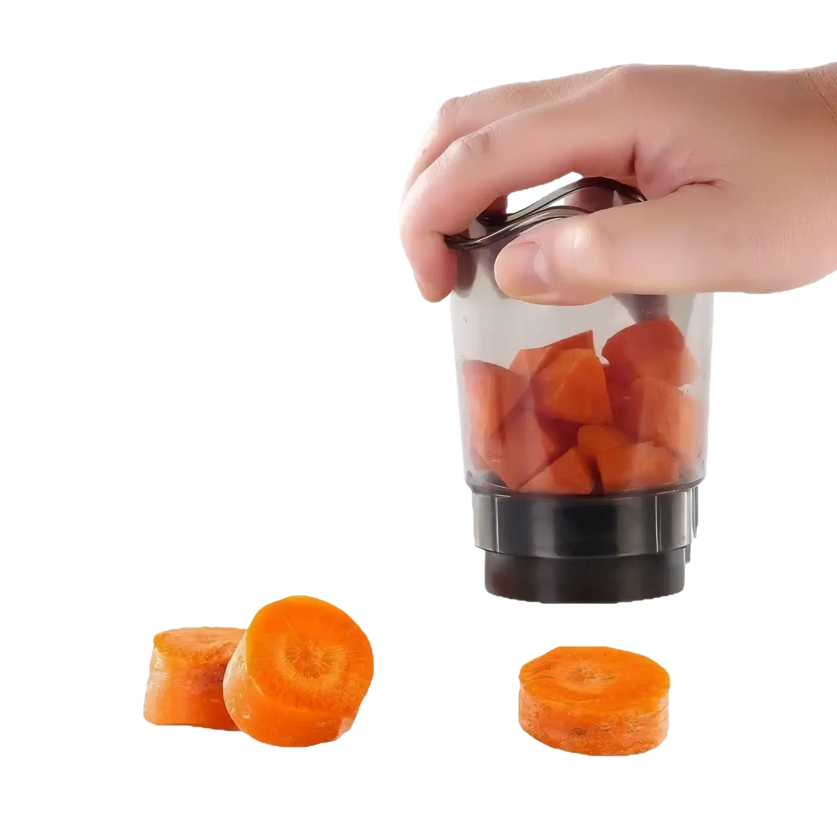 Transparent plastic handheld fruit and vegetable chopper slicer with black base and handle containing chopped carrots