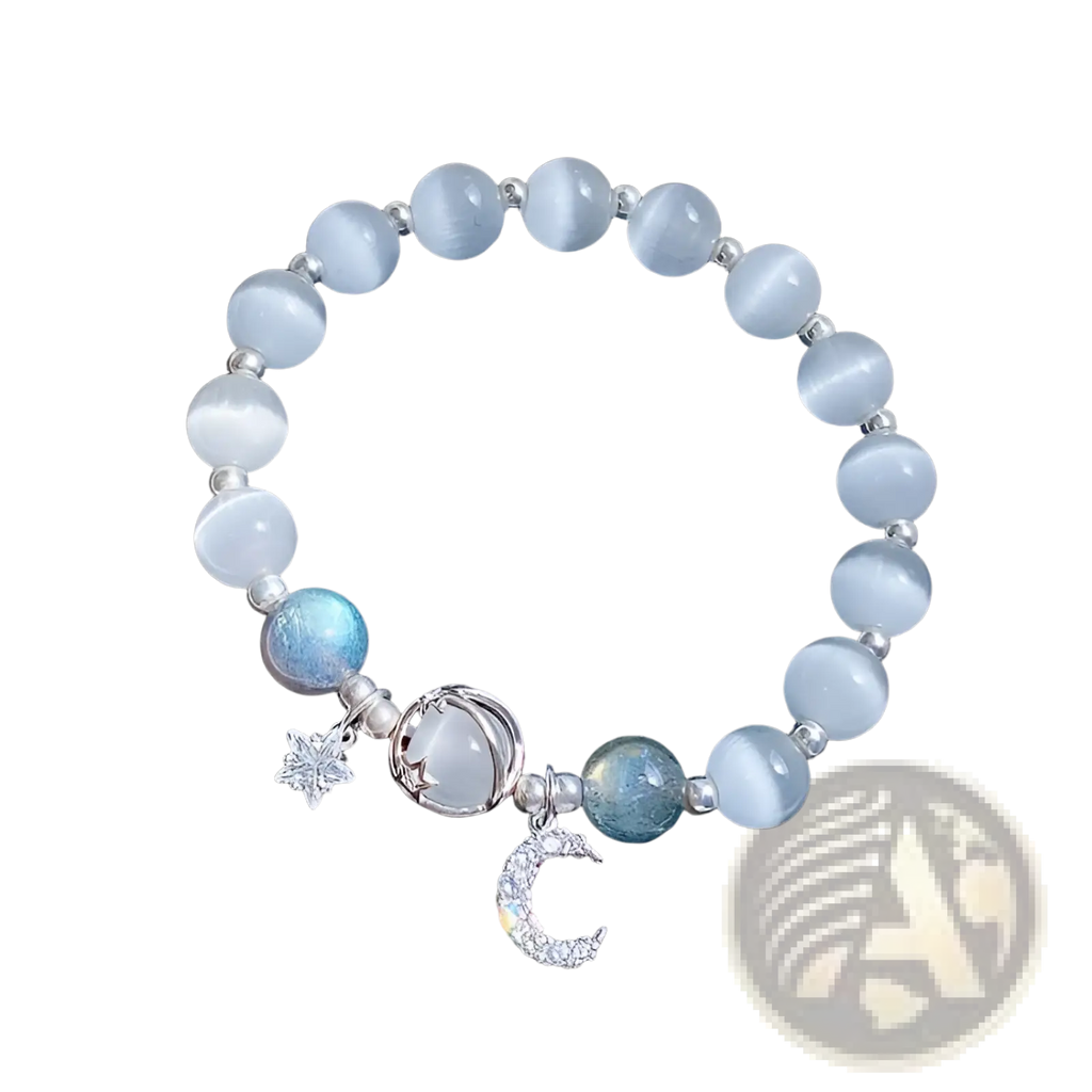 Handmade celestial moon and star crystal bead bracelet with light blue cat’s eye beads and silver crescent moon charm