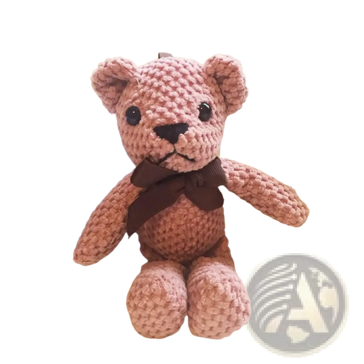 Handmade crochet teddy bear plush toy in soft pink yarn with black button eyes and brown ribbon bow
