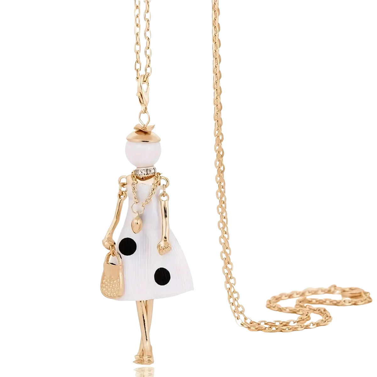 Handmade fashion pendant necklace with a gold-toned chain featuring a white enamel doll pendant with black polka dots