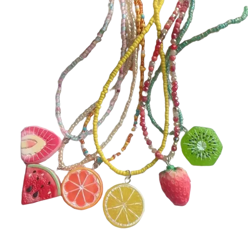 Handmade bohemian pendant necklace collection with colorful resin fruit-shaped pendants and beaded chokers