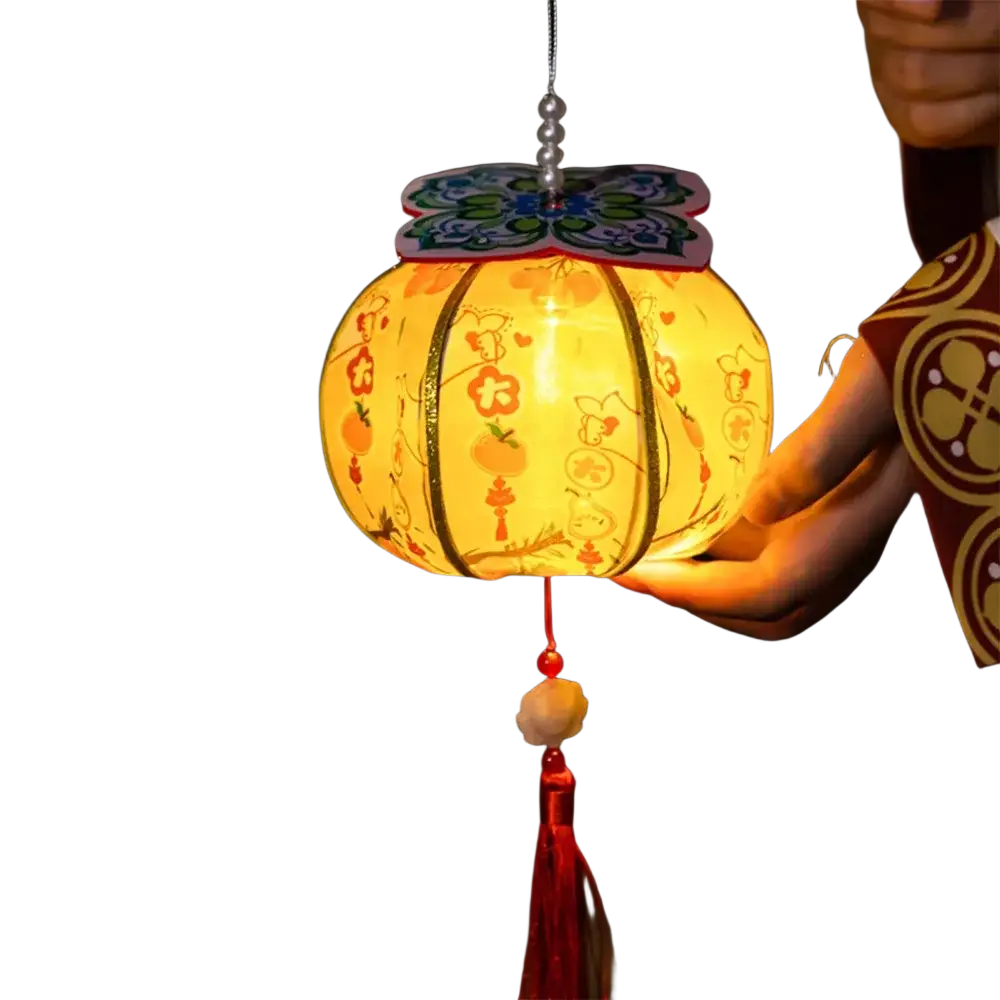 A handmade persimmon paper lantern glowing yellow with intricate orange and blue floral patterns and butterfly top