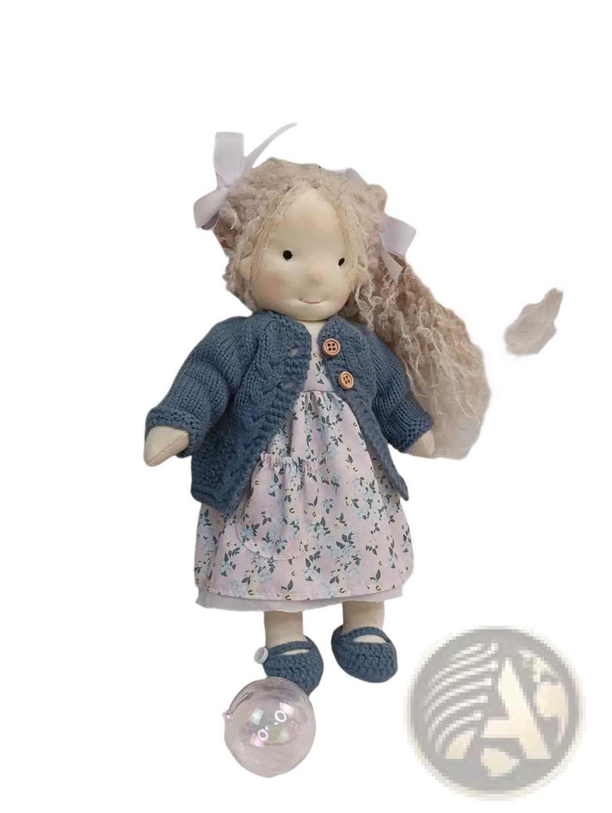 Handmade plush doll with golden curly hair wearing a blue knitted cardigan and floral dress 30cm tall