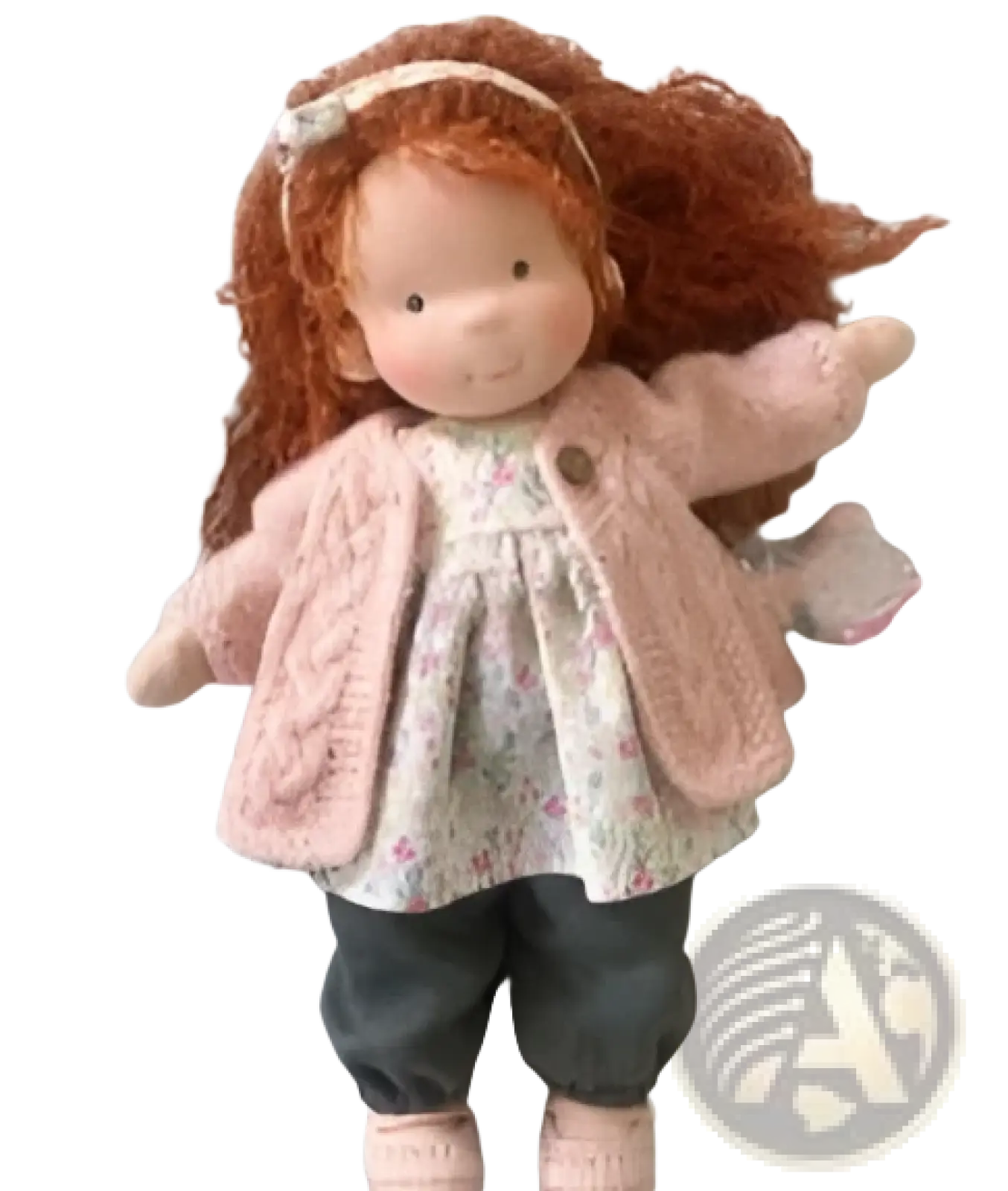 Handmade plush doll with long auburn hair rosy cheeks wearing pink knitted cardigan floral dress and dark gray pants