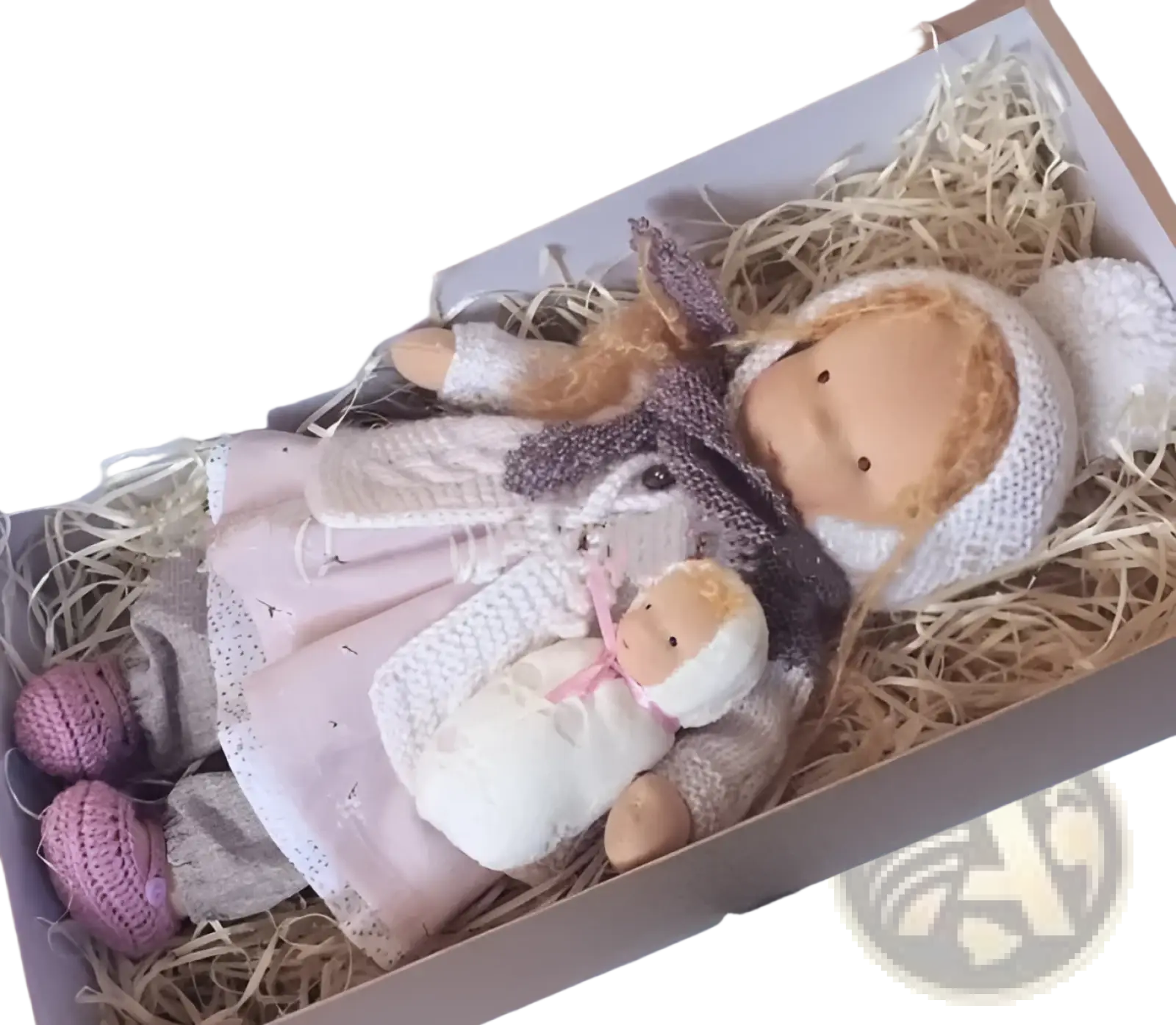 Handmade plush doll with golden curly yarn hair wearing a pink dress beige knit pants and white bonnet 30cm tall