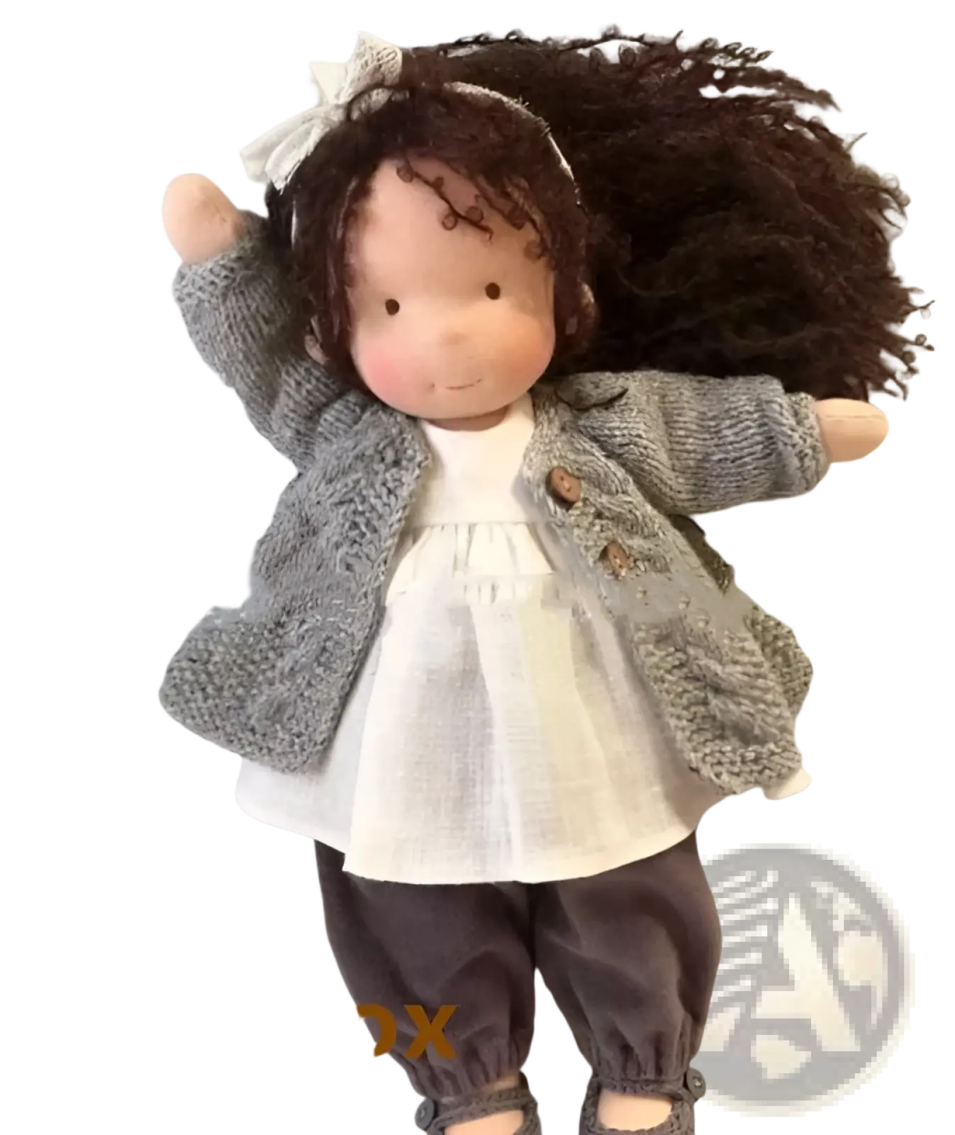 Handmade plush doll with golden curly brown hair wearing a gray knitted jacket white dress and dark pants 30cm tall