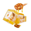 Handmade soap natural honey essential oil 2 pack with golden bars in yellow packaging and honey dipper dripping amber honey