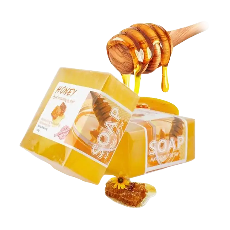 Handmade soap natural honey essential oil 2 pack with golden bars in yellow packaging and honey dipper dripping amber honey