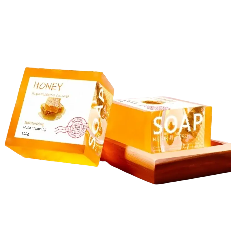 Handmade soap natural honey essential oil bar in translucent orange packaging labeled honey soap two pack