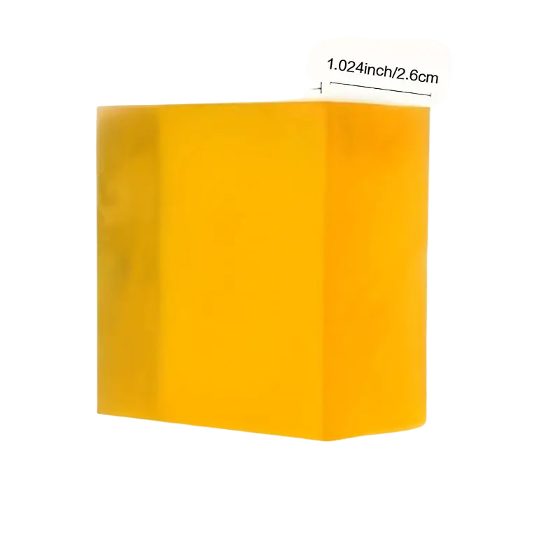 A translucent yellow handmade soap bar with natural honey essential oil measuring 2.09 by 1.024 by 2.09 inches