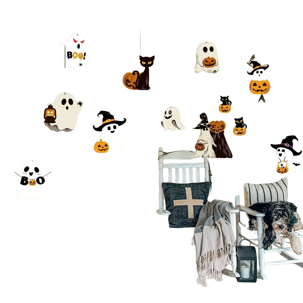 White paper ghost hanging ornaments with black eyes and orange pumpkin accents for spooky halloween party decor