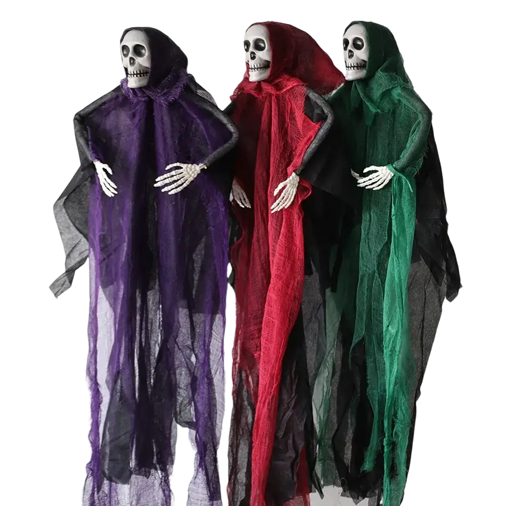 Three hanging skeleton ghost halloween decorations draped in sheer purple red and green cloaks with black inner layers