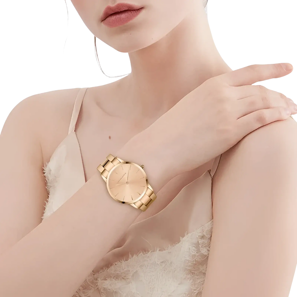 Hannah Martin rose gold minimalist women watch set featuring a gold-toned stainless steel watch with a slim dial and hands