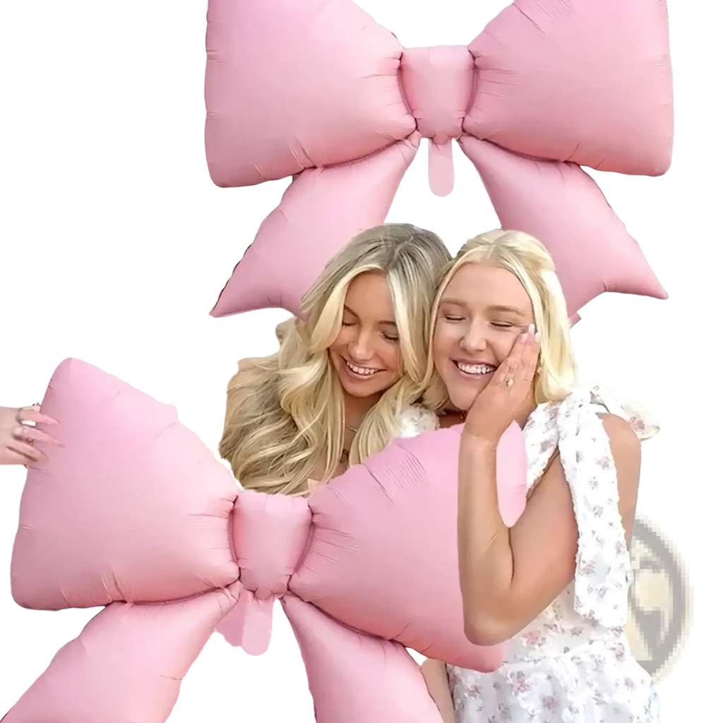 Pink plush bow-shaped pillow with soft cushioned texture in happy birthday balloon banner with pink bows product