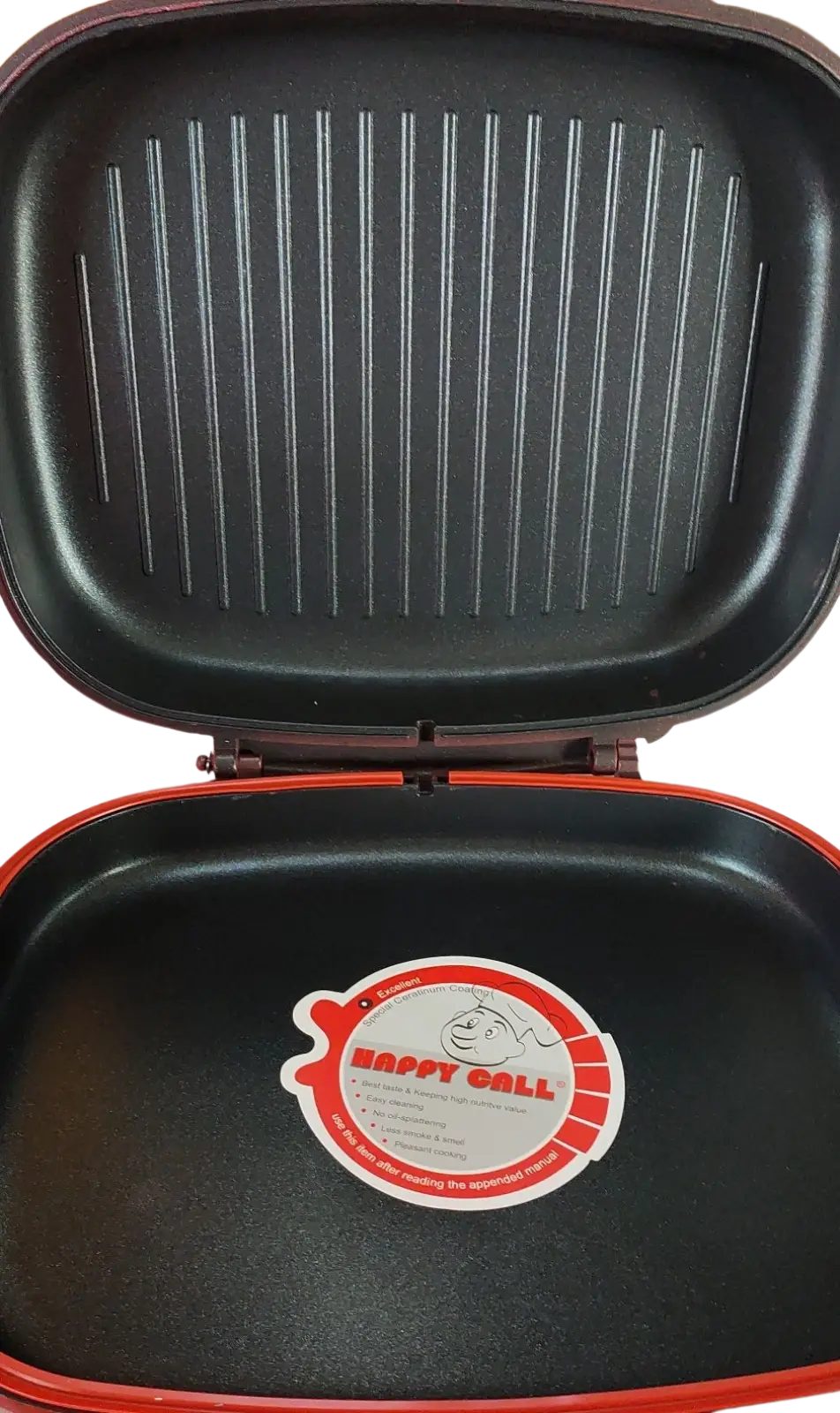 Black and orange happycall 32cm non stick double sided grill pan with ribbed cooking surface and red lid