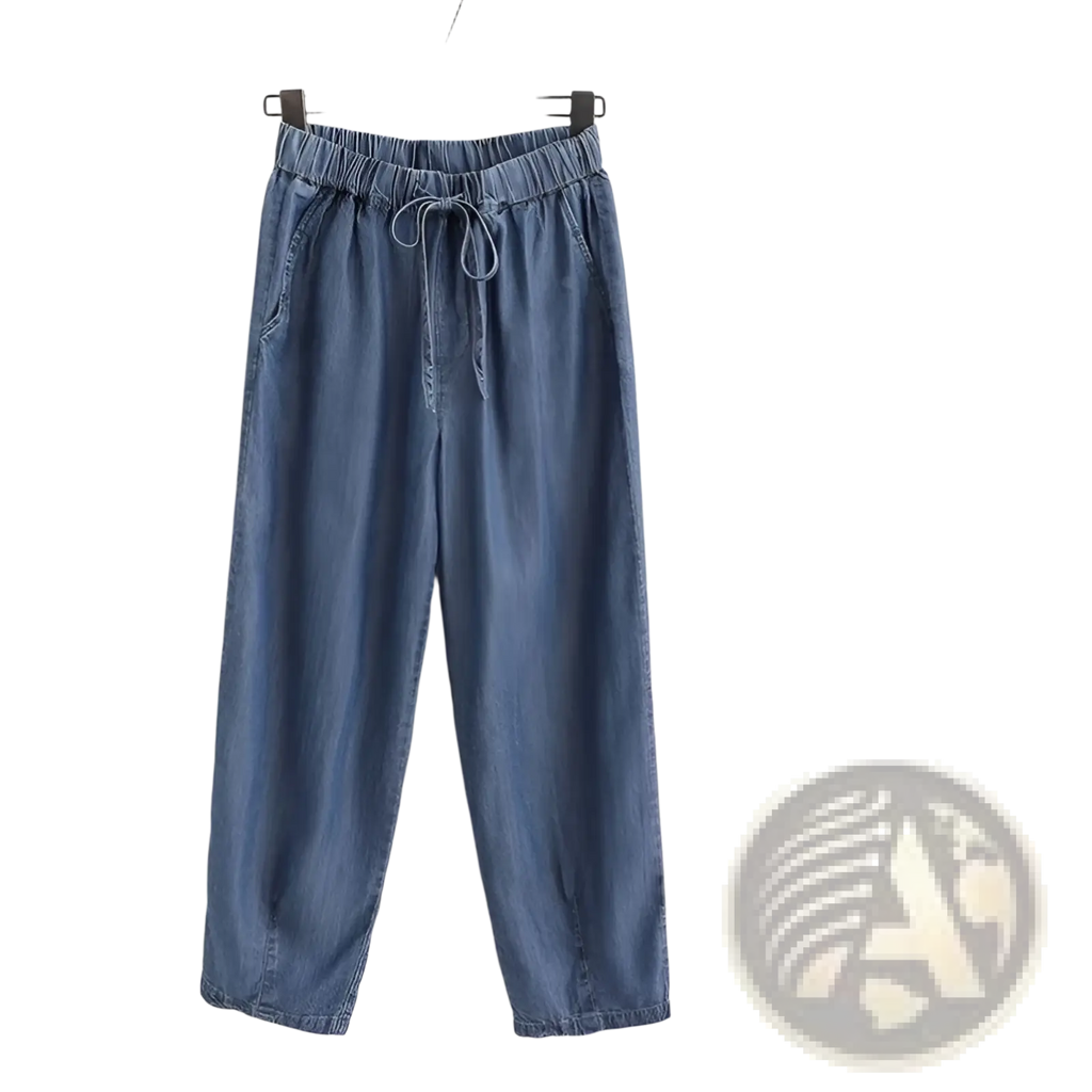 Blue denim harem jeans with a high waist elastic waistband and drawstring for comfortable fit