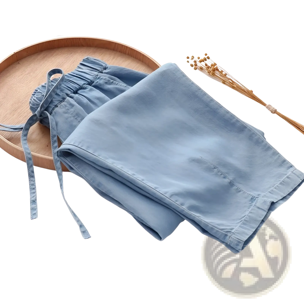 Light blue cotton shorts with elastic waistband and drawstring resembling harem jeans high waisted denim pants