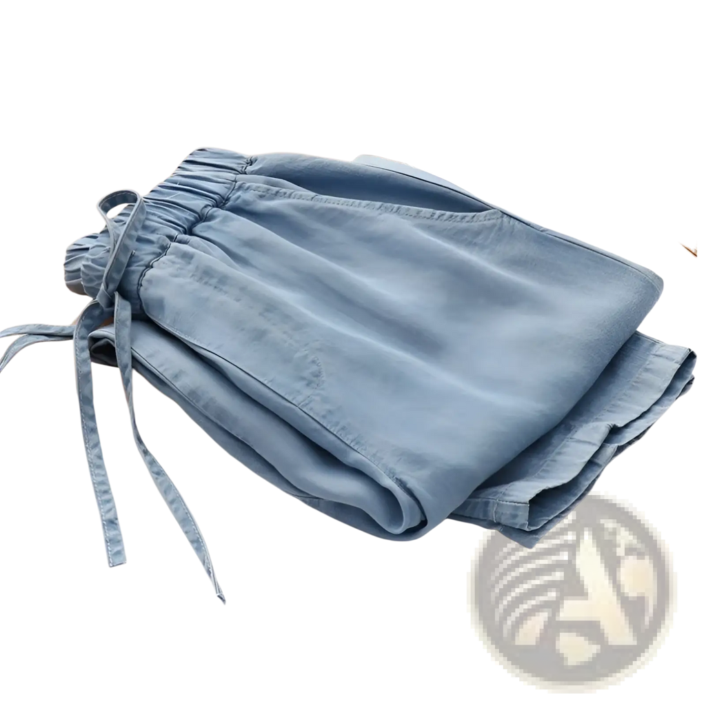 Light blue denim harem jeans shorts with high waist elastic waistband and adjustable drawstring closure