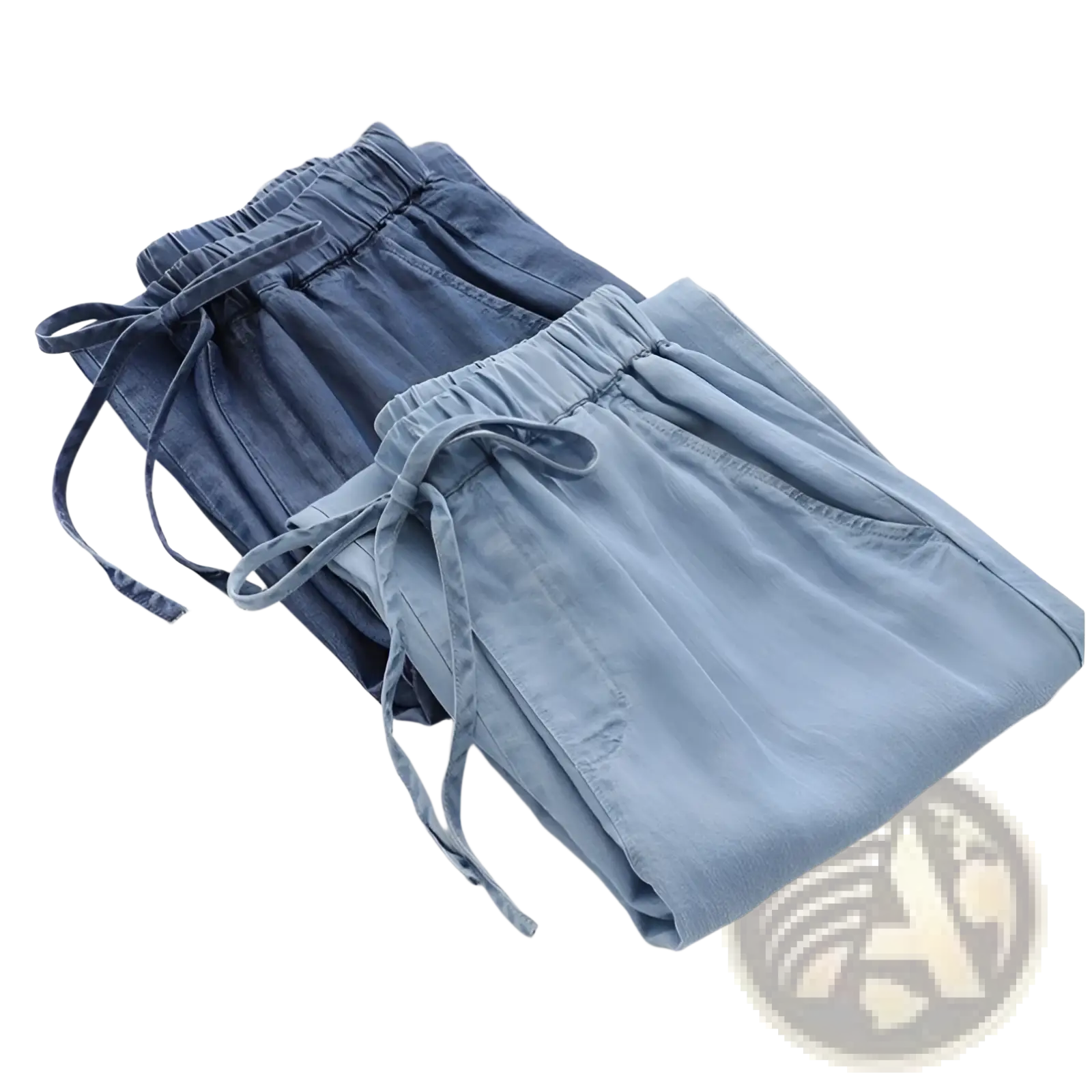 A pair of light blue high waisted harem jeans with elastic waistband and drawstring made of denim material