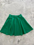 Harper emerald green pleated skater skirt with pockets made of smooth shiny fabric and elastic waistband