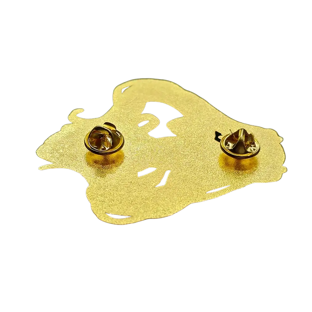Golden metal enamel pin shaped like a stylized face with cut-out details for hatsune miku anime badge