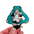 A turquoise-haired Hatsune Miku anime enamel pin with black and white outfit details metal badge