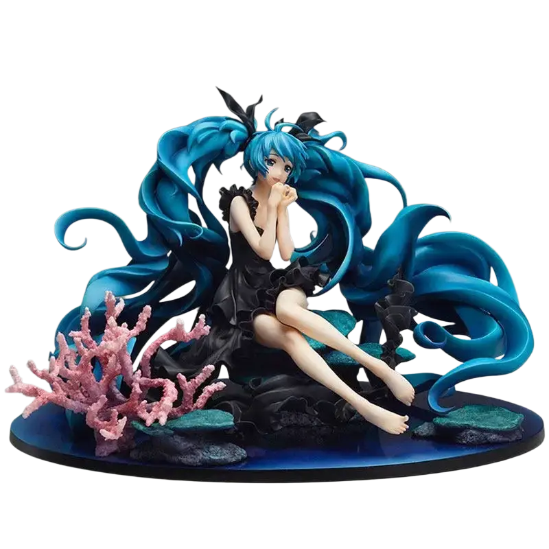 A detailed Hatsune Miku figma deep sea girl pvc figure with vibrant blue hair seated on an ocean-themed base of coral and rocks