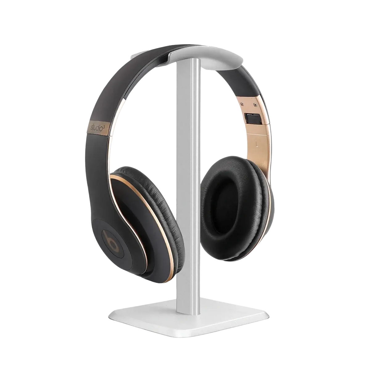 Black and rose gold beats studio3 headphones displayed on a matte black aluminum headphone stand desktop holder