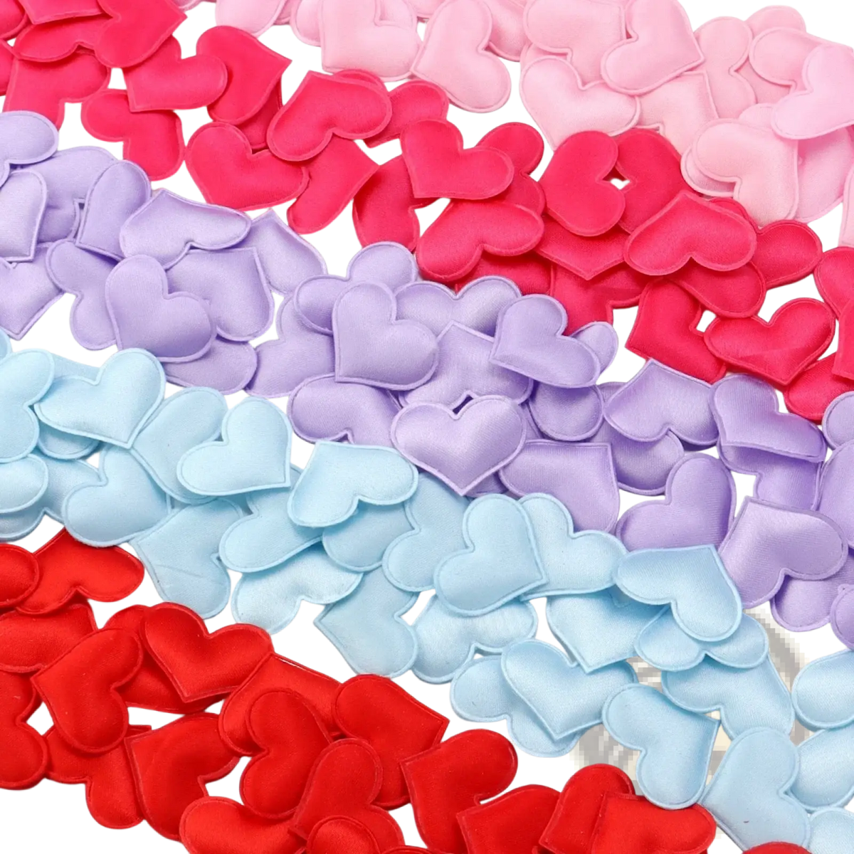 Heart confetti fabric table decor featuring pastel red pink purple and light blue heart shapes for valentine parties